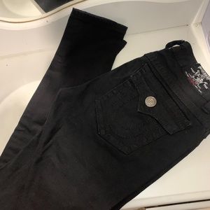 Women’s black true religions.